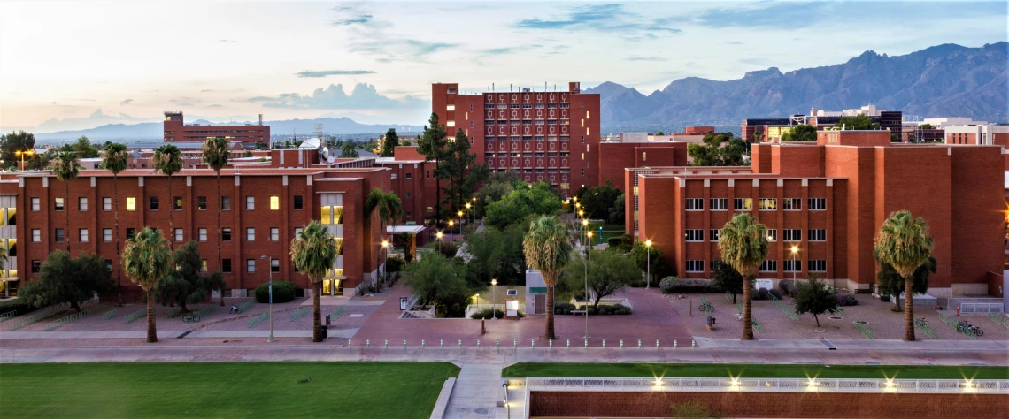 red brick campus buildings on mall 